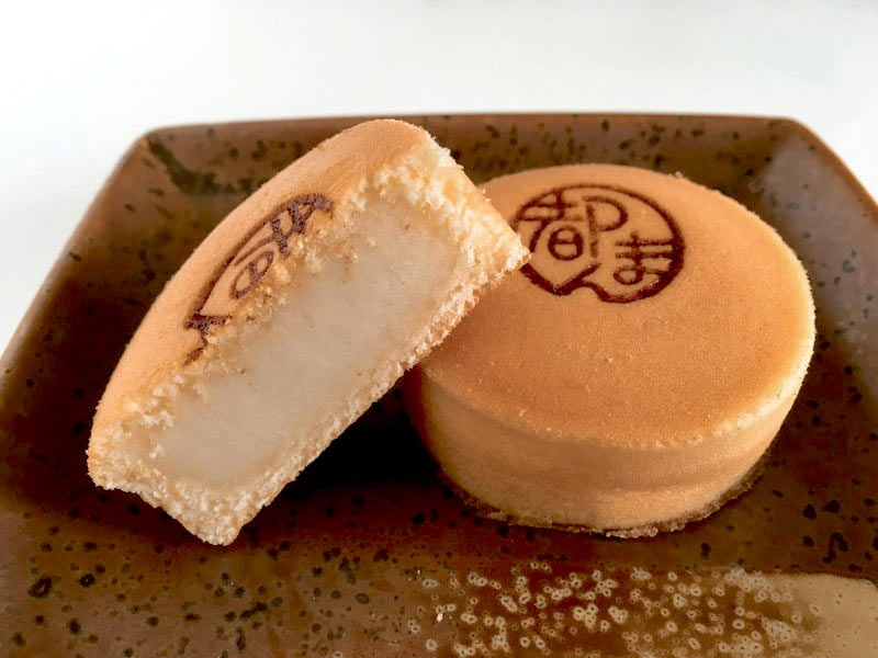 都まん中身