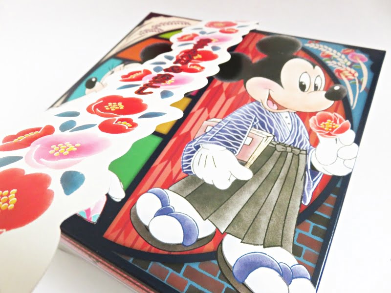 TDR おせんべい&おこし 帯をとっている写真