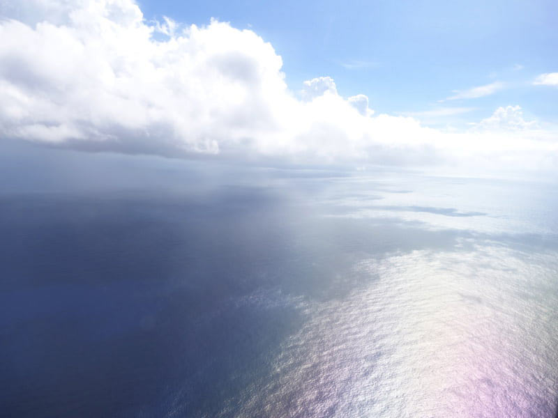 与論空港から飛んだ飛行機から見る沖縄の海