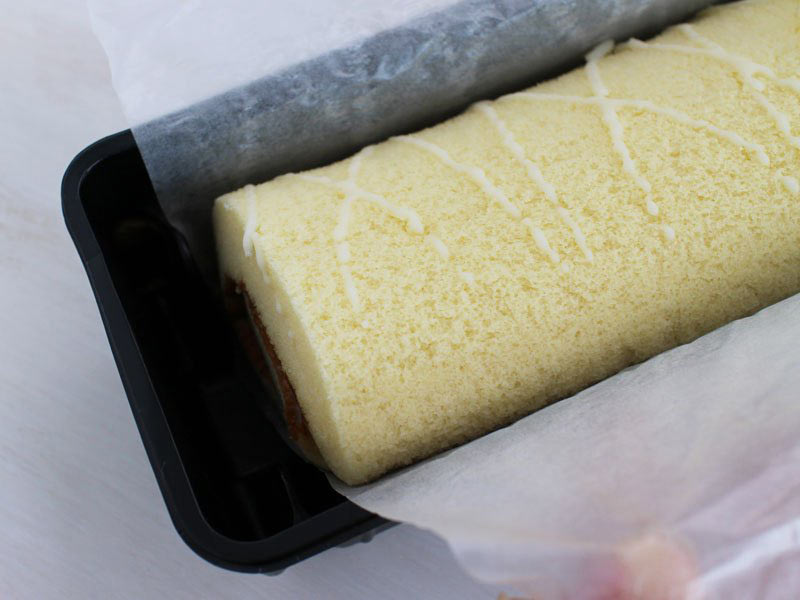 飛騨牛乳チーズロールケーキのクロス柄の写真