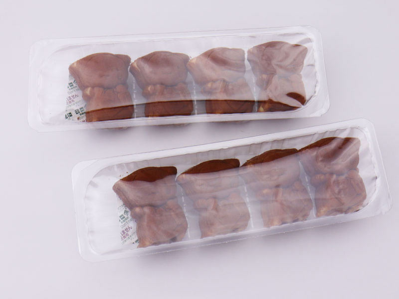 ふたごのさるぼぼ人形焼きのパックの写真